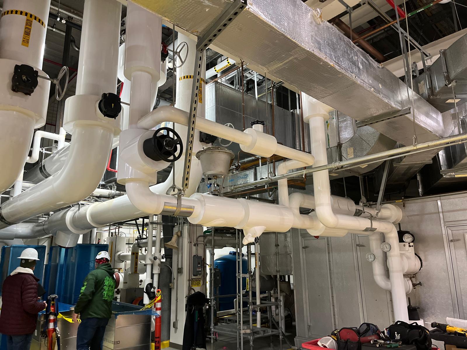Ecostep crew working in an operating plant