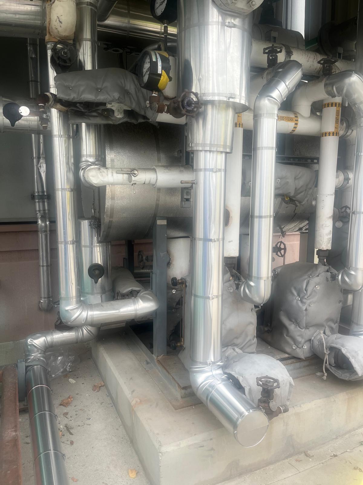 Metal jacketed insulation on pipe and fittings