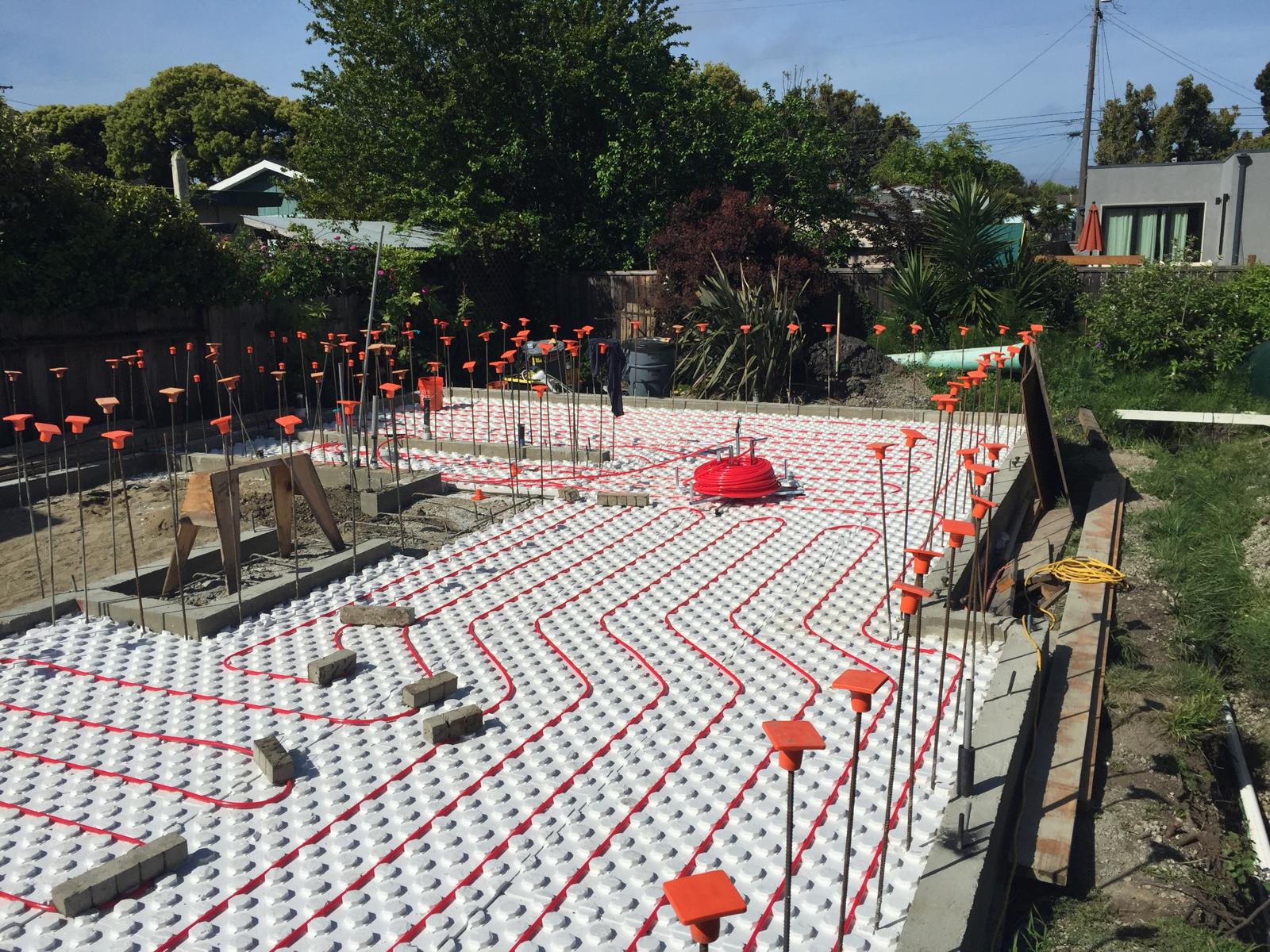 Radiant heating tubing laid before the pour